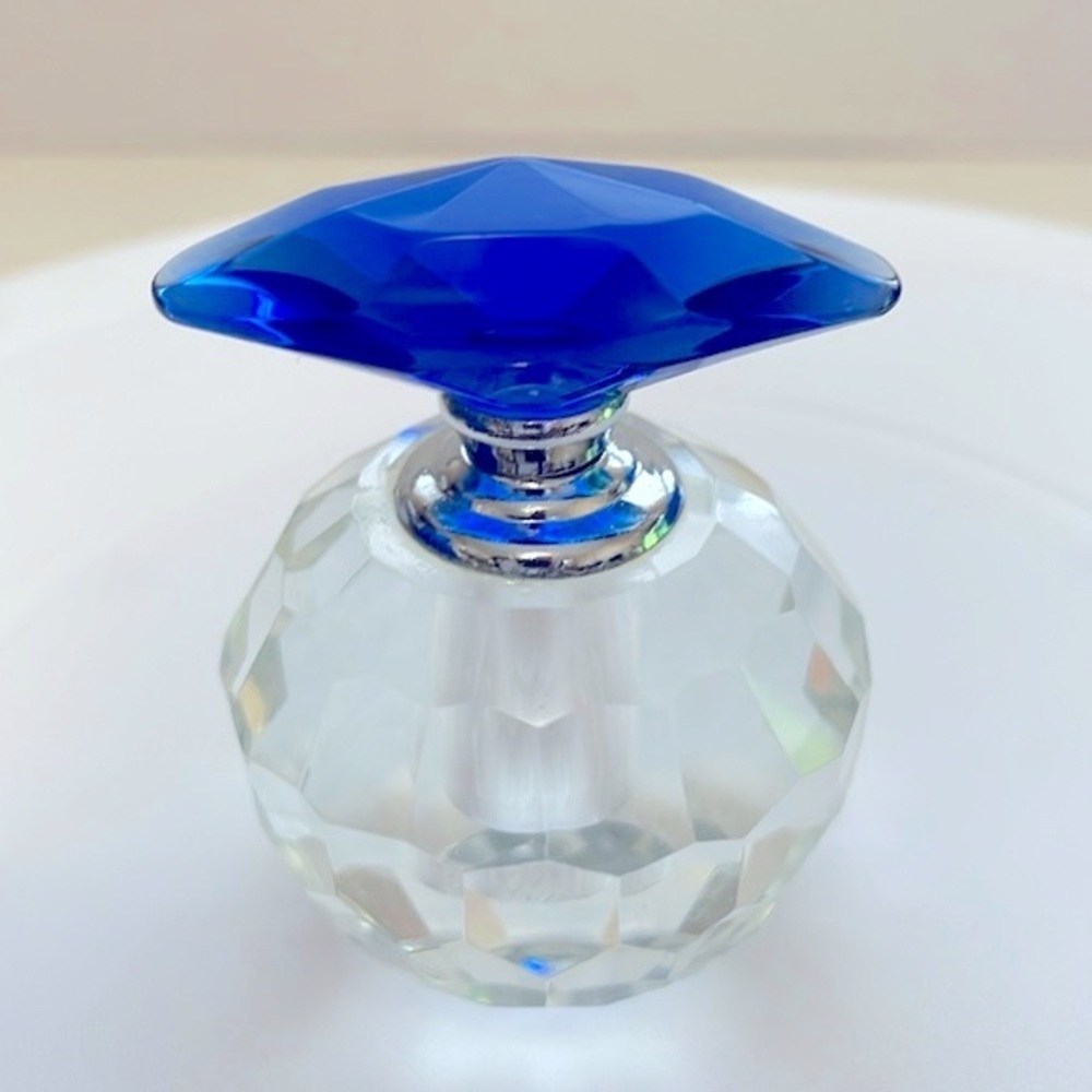 Clear Perfume Bottle with Blue Lid